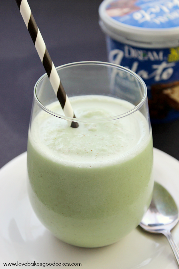Dairy-Free Frozen Grasshopper in a clear glass with a straw.