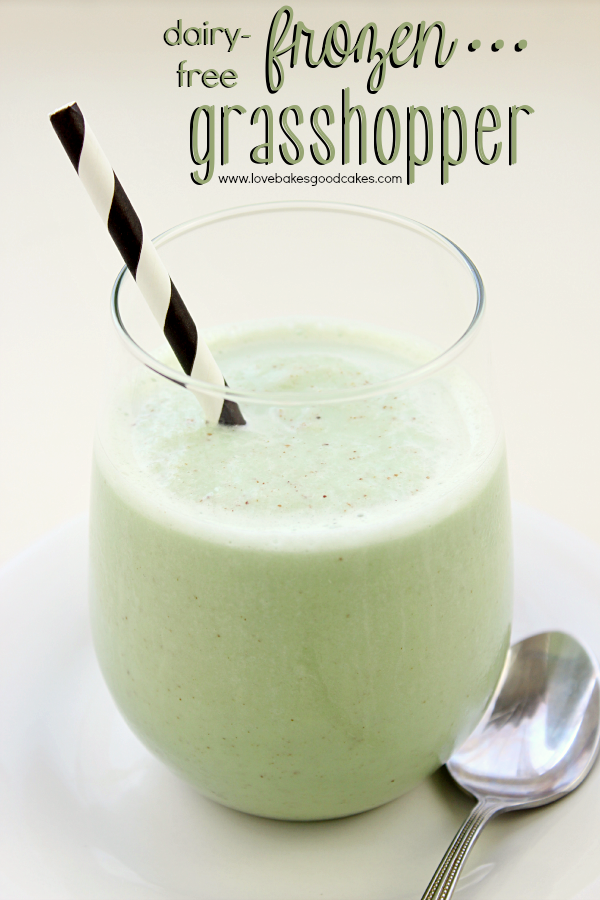 Dairy-Free Frozen Grasshopper in a glass with a straw and a spoon.