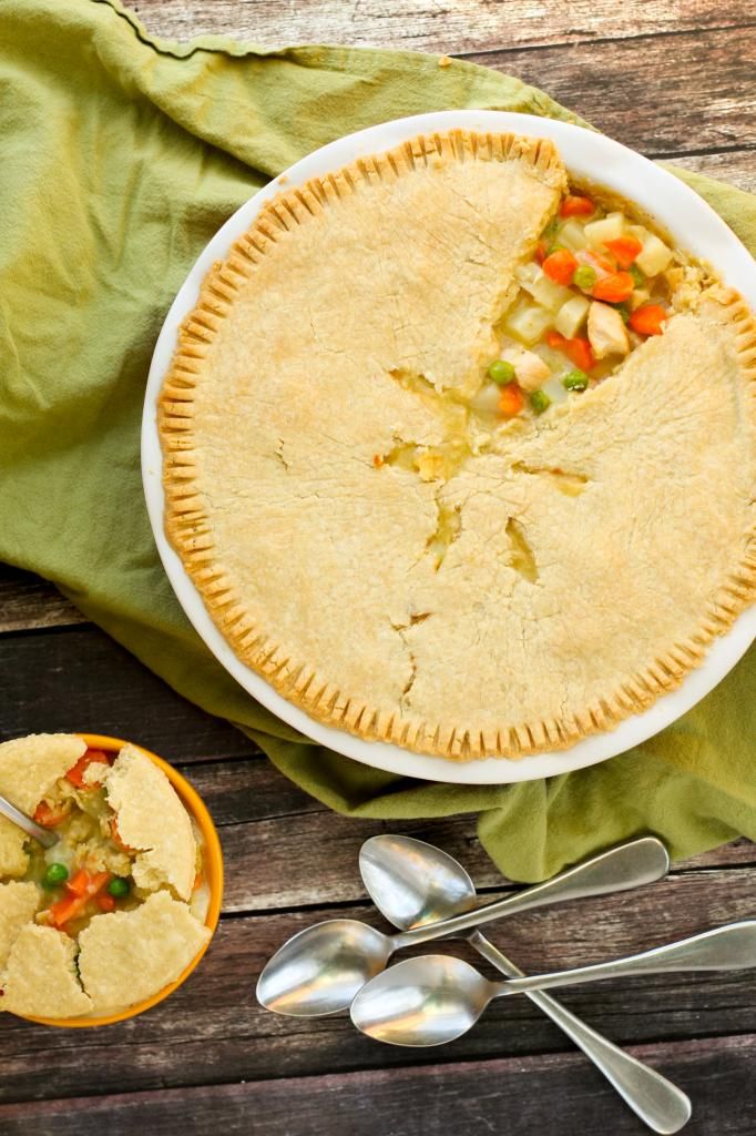 Creamy gluten-free chicken pot pie with a flaky gluten-free pie crust tastes just as good as you remember it. Peas, carrots, potatoes and chicken in a creamy gravy between two layers of buttery pie crust. It's almost too good to be true!